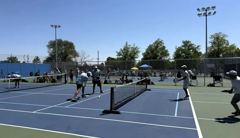 Players competing in open play at Reno Tennis Center, intermediate DUPR 3.0–4.0 level